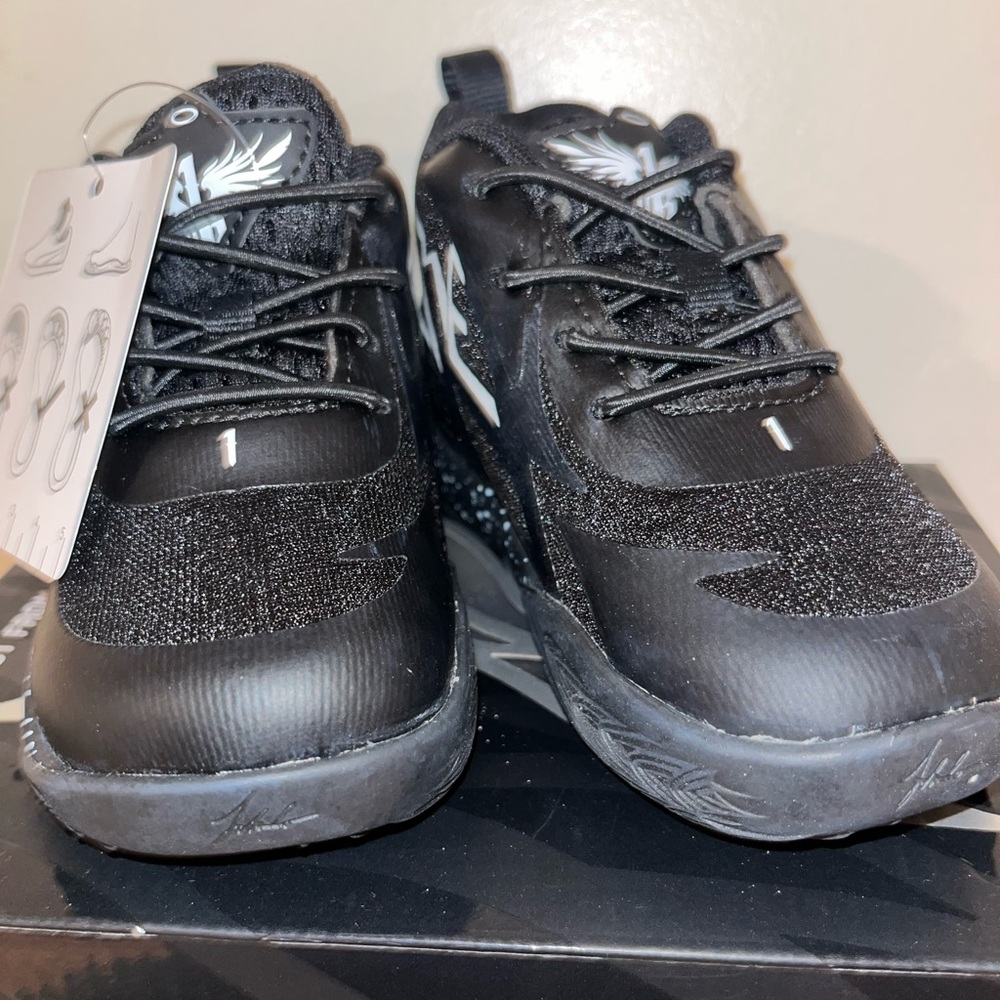 Black toddler pumas